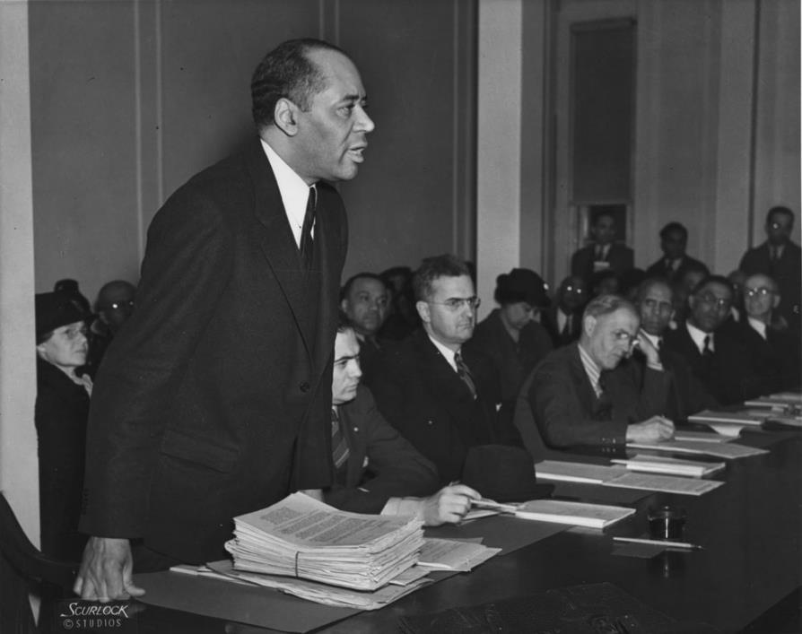 Charles Hamilton Houston presents a brief, ca. 1931. Courtesy, Scurlock Studio Records, Archives Center, Smithsonian Museum of American History